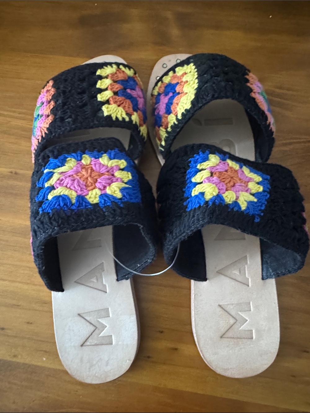 Manebi sandals from india
Handwoven Black Crochet Slide Sandals with Multicolor.